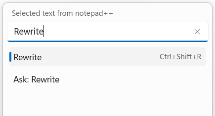 The Selection actions menu with Rewrite typed in its box, showing two rows: the Rewrite action with its shortcut Ctrl+Shift+R, and Ask: Rewrite.