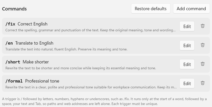 The Commands list, with Restore defaults and Add command buttons, holding the four built-in inline commands: /fix Correct English, /en Translate to English, /short Make shorter and /formal Professional tone, each with its instruction, an Edit button and a delete button. A note beneath explains that a trigger is a slash followed by letters, numbers, hyphens or underscores.